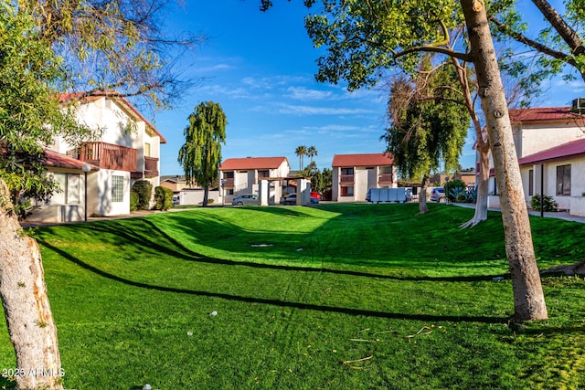 view of yard featuring a residential view