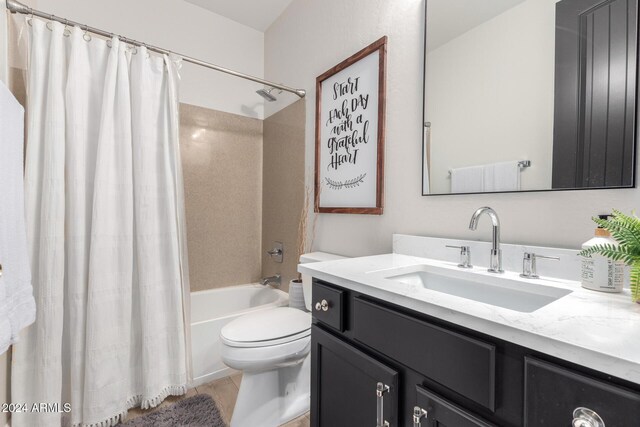 full bathroom featuring vanity, toilet, and shower / bathtub combination with curtain