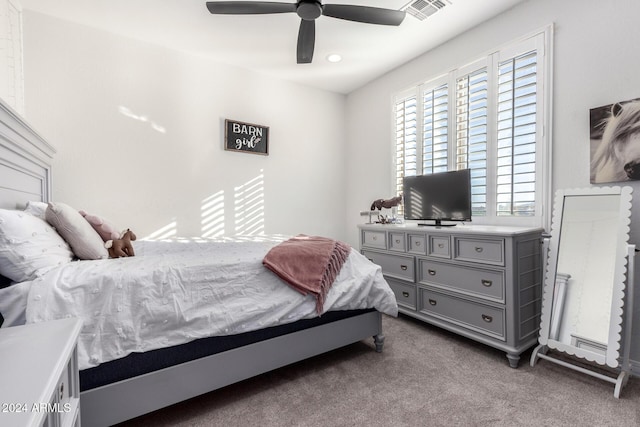 carpeted bedroom with ceiling fan