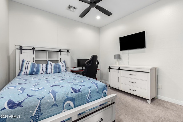 bedroom featuring ceiling fan and light colored carpet