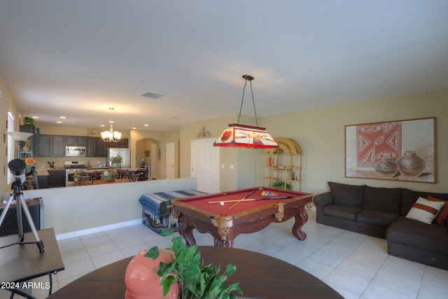 rec room featuring pool table, a chandelier, and light tile patterned floors