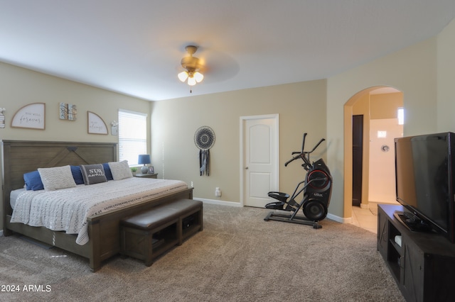 carpeted bedroom featuring ceiling fan