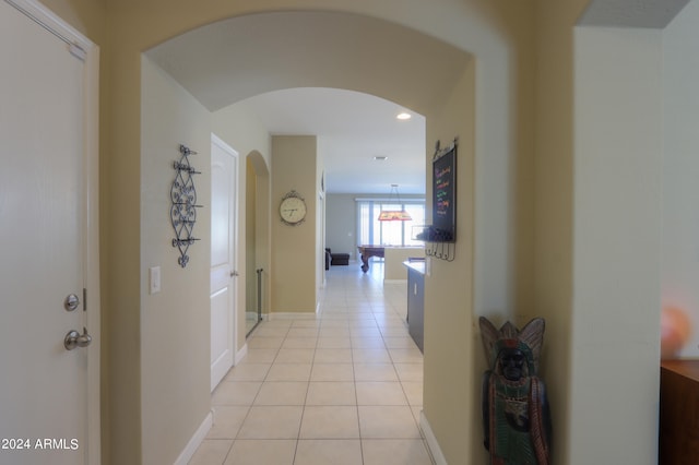 hallway with light tile patterned flooring