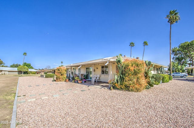 view of front of home featuring a patio