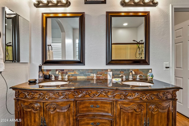 bathroom featuring wood-type flooring and vanity