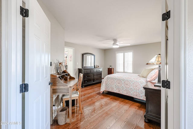 bedroom featuring ceiling fan and light wood-type flooring