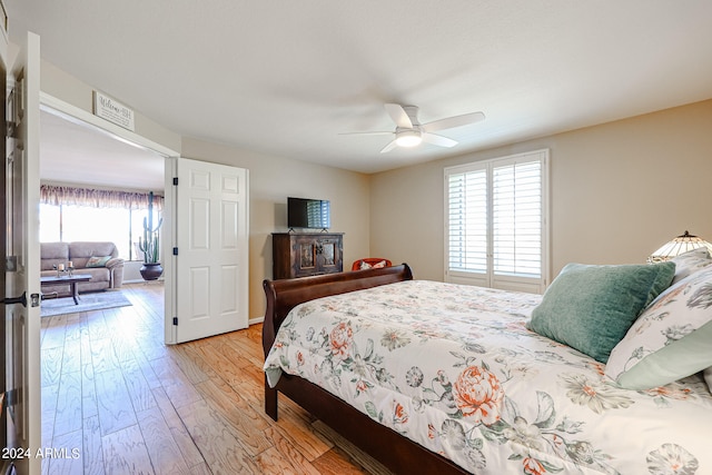 bedroom featuring ceiling fan and light wood-type flooring