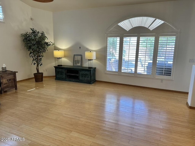 living room featuring plenty of natural light and wood finished floors