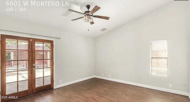 6601 W Montego Ln, Glendale, AZ 85306 - empty room with french doors, vaulted ceiling, dark wood-style floors, baseboards, and ceiling fan
