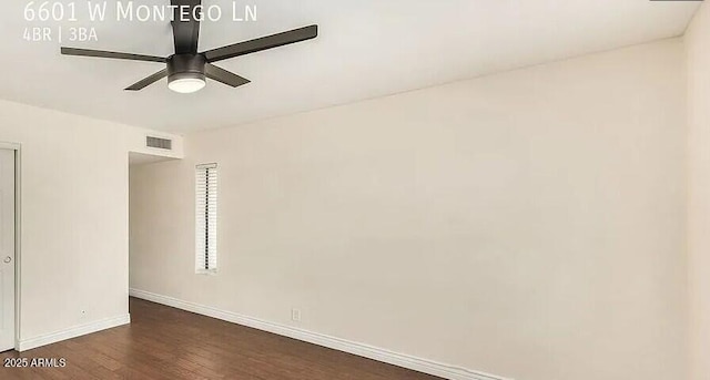 6601 W Montego Ln, Glendale, AZ 85306 - empty room with ceiling fan, dark wood-style flooring, and baseboards