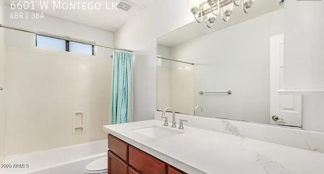 6601 W Montego Ln, Glendale, AZ 85306 - full bath featuring shower / bath combo with shower curtain, vanity, and toilet