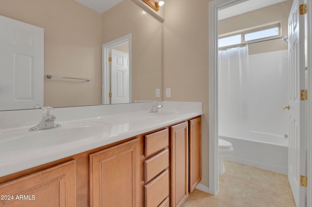 full bathroom with vanity, shower / bath combination with curtain, and toilet