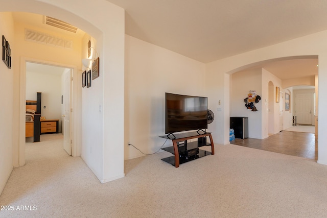 170 E Canary Ct, San Tan Valley, AZ 85143 - living area featuring carpet floors and arched walkways