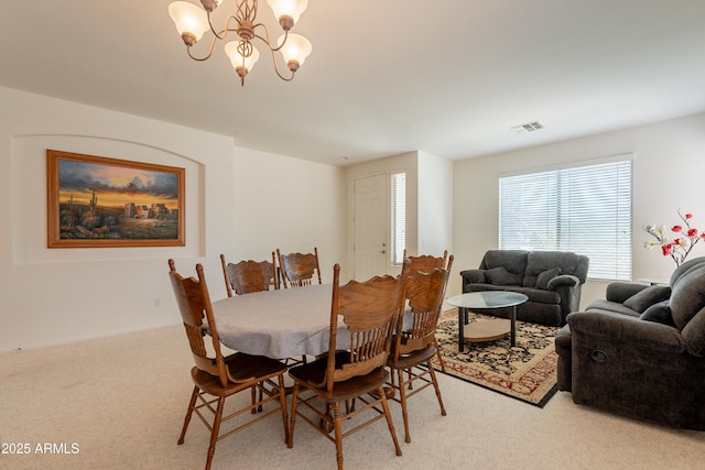 170 E Canary Ct, San Tan Valley, AZ 85143 - carpeted dining area featuring a chandelier