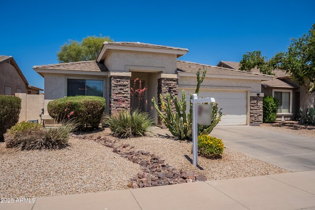 170 E Canary Ct, San Tan Valley, AZ 85143 - prairie-style home featuring stone siding, a garage, and stucco siding