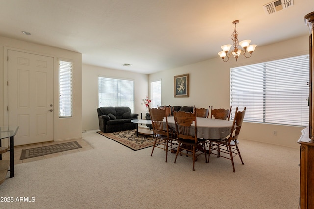 170 E Canary Ct, San Tan Valley, AZ 85143 - carpeted dining area featuring a chandelier