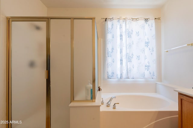 170 E Canary Ct, San Tan Valley, AZ 85143 - bathroom with a garden tub, a stall shower, and vanity