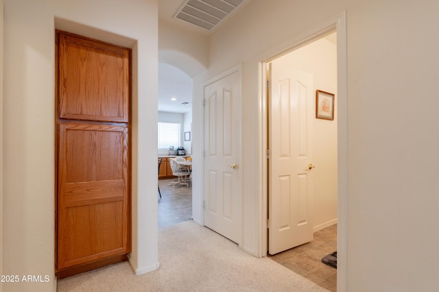 170 E Canary Ct, San Tan Valley, AZ 85143 - hallway featuring arched walkways, recessed lighting, and baseboards