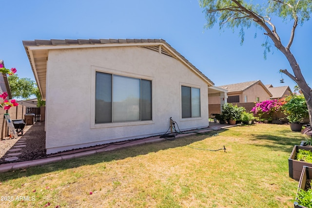 170 E Canary Ct, San Tan Valley, AZ 85143 - rear view of property featuring stucco siding