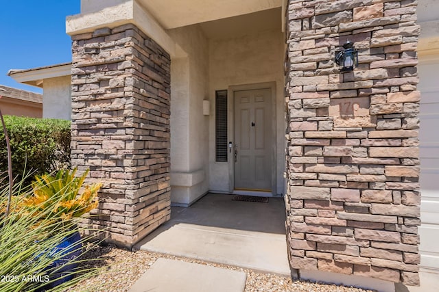 170 E Canary Ct, San Tan Valley, AZ 85143 - view of exterior entry featuring stucco siding