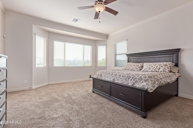 bedroom featuring a ceiling fan, visible vents, baseboards, light carpet, and crown molding