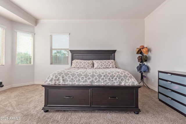 bedroom featuring baseboards, light carpet, and crown molding