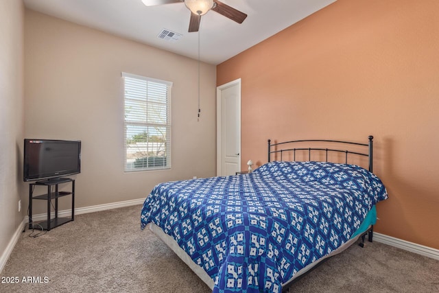 carpeted bedroom featuring visible vents, ceiling fan, and baseboards