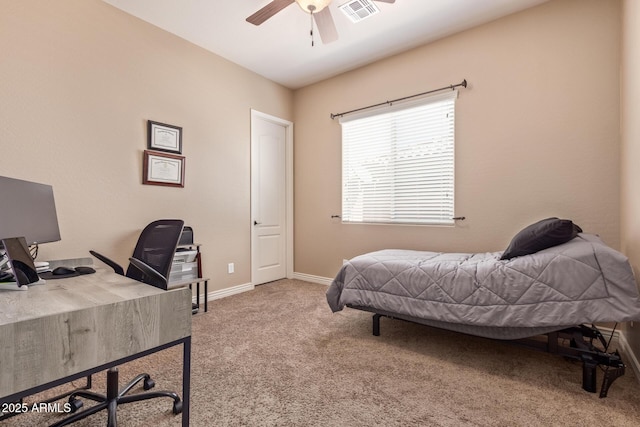 bedroom with visible vents, carpet floors, baseboards, and ceiling fan