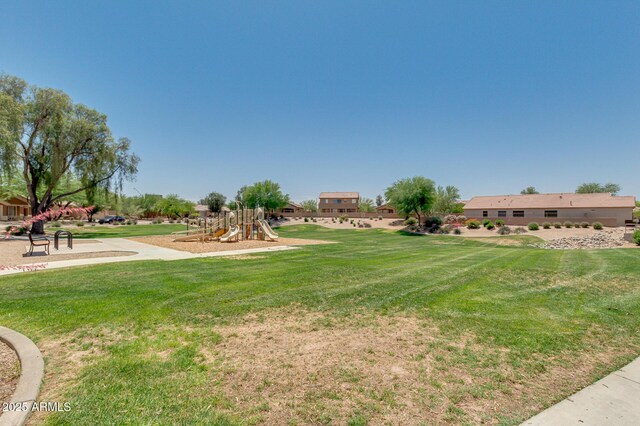 view of yard featuring playground community