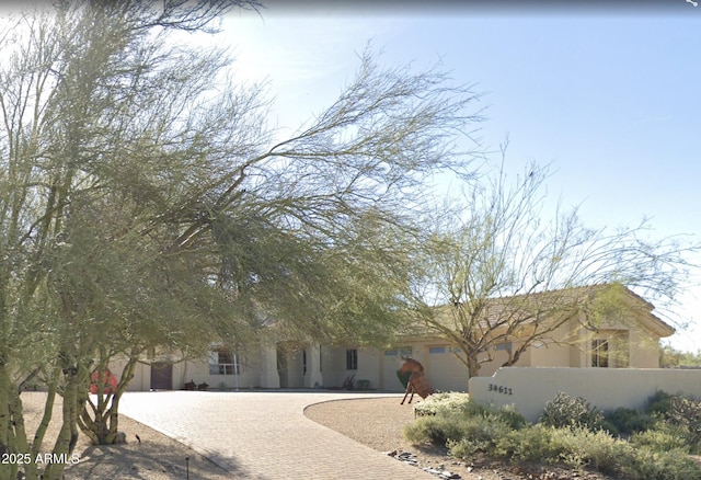 34611 N Sunset Trl, Cave Creek, AZ 85331 - view of front of house with curved driveway and stucco siding