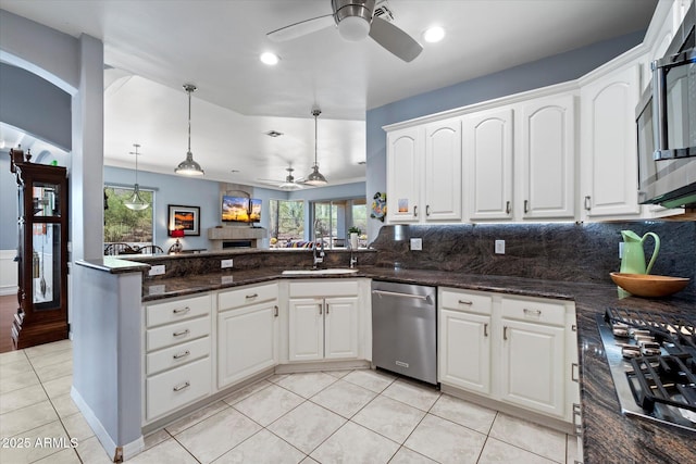 34611 N Sunset Trl, Cave Creek, AZ 85331 - kitchen featuring a ceiling fan, appliances with stainless steel finishes, healthy amount of natural light, light tile patterned floors, and recessed lighting