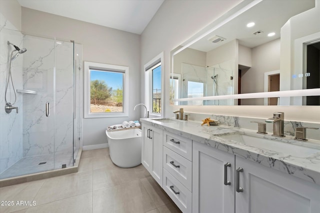 34611 N Sunset Trl, Cave Creek, AZ 85331 - bathroom with a marble finish shower, double vanity, a soaking tub, tile patterned floors, and recessed lighting