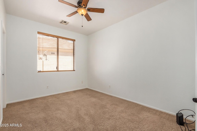 13599 W Monte Vista Rd, Goodyear, AZ 85395 - spare room with carpet, a ceiling fan, and baseboards
