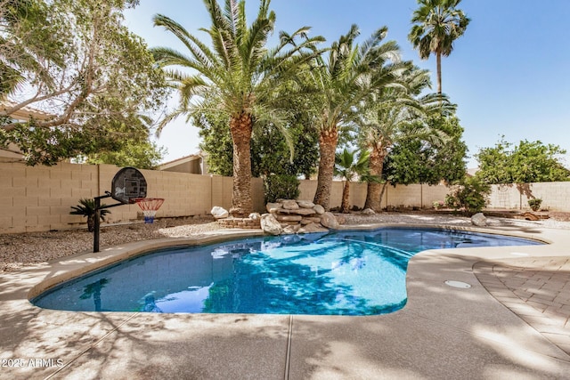 13599 W Monte Vista Rd, Goodyear, AZ 85395 - view of pool with a fenced backyard and a patio