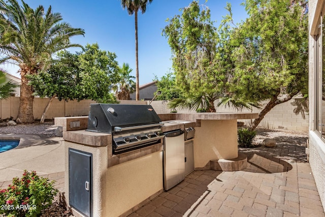 13599 W Monte Vista Rd, Goodyear, AZ 85395 - fenced backyard with a patio