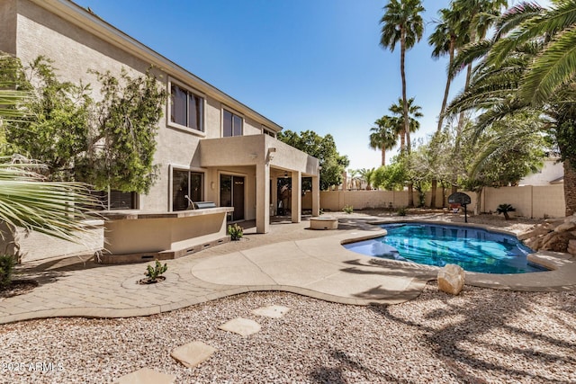 13599 W Monte Vista Rd, Goodyear, AZ 85395 - view of swimming pool featuring a patio area and a fenced backyard