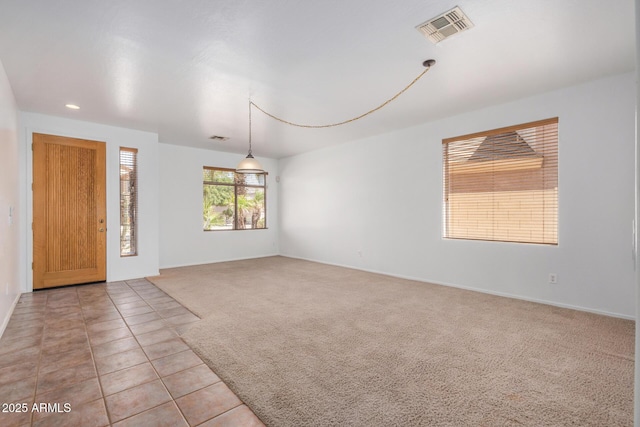 13599 W Monte Vista Rd, Goodyear, AZ 85395 - empty room featuring light carpet and recessed lighting