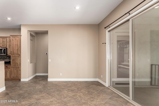 6805 S Sapphire Way, Chandler, AZ 85249 - empty room with recessed lighting and baseboards