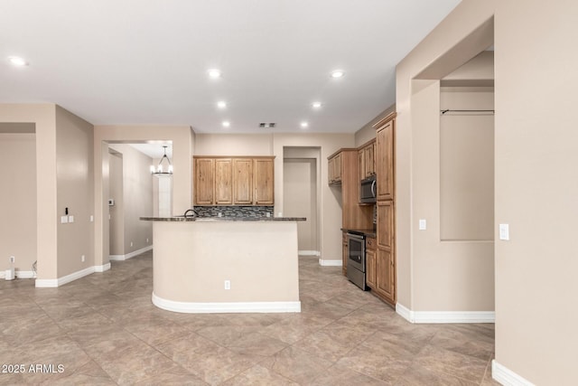 6805 S Sapphire Way, Chandler, AZ 85249 - kitchen featuring stainless steel appliances, tasteful backsplash, a chandelier, recessed lighting, and baseboards