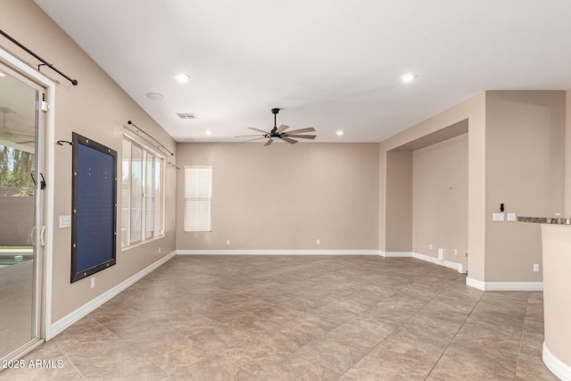 6805 S Sapphire Way, Chandler, AZ 85249 - empty room featuring a ceiling fan, plenty of natural light, recessed lighting, and baseboards