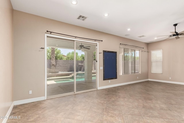 6805 S Sapphire Way, Chandler, AZ 85249 - unfurnished room with ceiling fan, plenty of natural light, recessed lighting, and baseboards