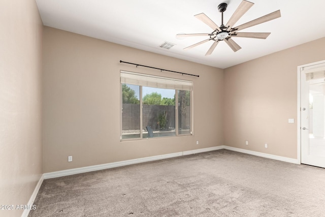 6805 S Sapphire Way, Chandler, AZ 85249 - carpeted spare room with baseboards and a ceiling fan