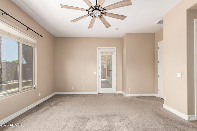 6805 S Sapphire Way, Chandler, AZ 85249 - empty room with carpet flooring, a ceiling fan, and baseboards