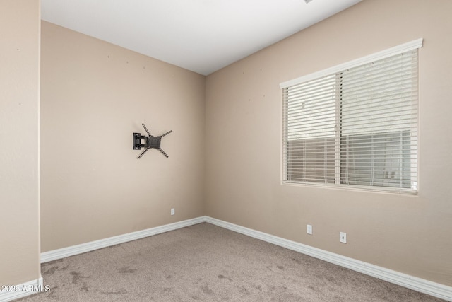 6805 S Sapphire Way, Chandler, AZ 85249 - carpeted spare room featuring baseboards
