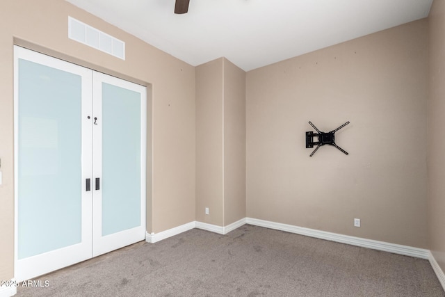 6805 S Sapphire Way, Chandler, AZ 85249 - unfurnished room with french doors, carpet floors, baseboards, and ceiling fan