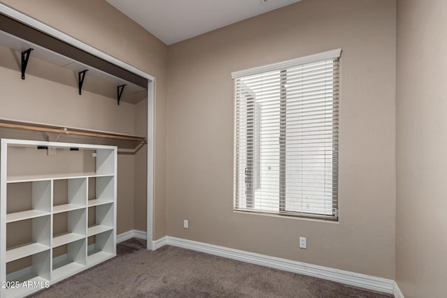 6805 S Sapphire Way, Chandler, AZ 85249 - unfurnished bedroom with carpet floors, multiple windows, baseboards, and a closet