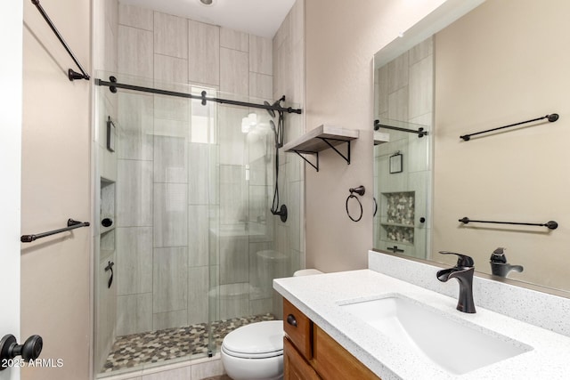 6805 S Sapphire Way, Chandler, AZ 85249 - bathroom with toilet, a stall shower, and vanity