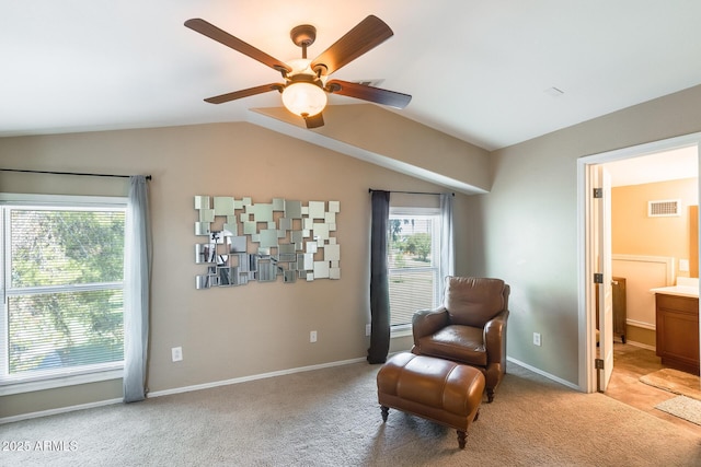5734 S 21st Pl, Phoenix, AZ 85040 - living area with ceiling fan, light carpet, and vaulted ceiling