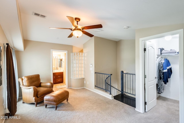 5734 S 21st Pl, Phoenix, AZ 85040 - living area with an upstairs landing, carpet floors, ceiling fan, and vaulted ceiling