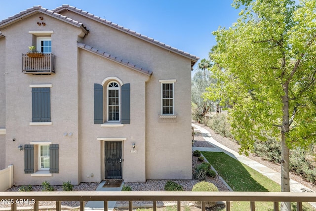 5734 S 21st Pl, Phoenix, AZ 85040 - view of front of home with stucco siding and a tiled roof